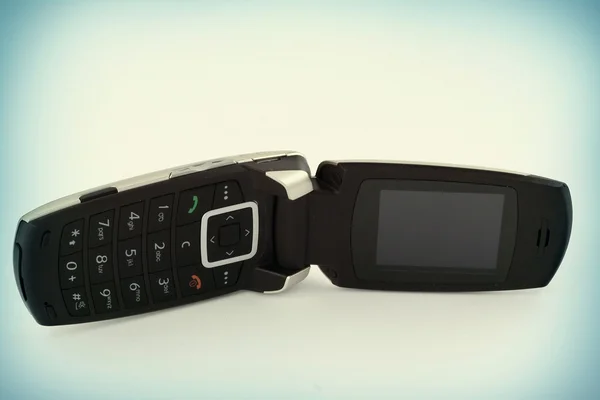 Telefone celular com aba — Fotografia de Stock