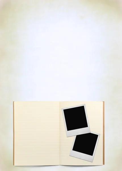 Exercise book and two photo frames — Stock Photo, Image