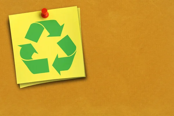 Recycling symbool op gele nota — Stockfoto