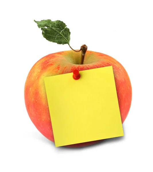 Apple with yellow note — Stock Photo, Image