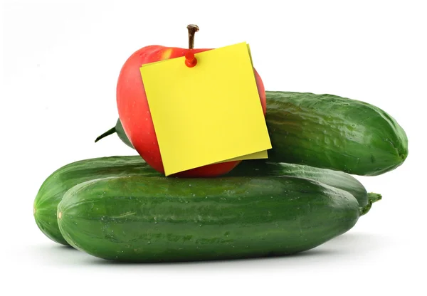 Cucumbers apple and note — Stock Photo, Image