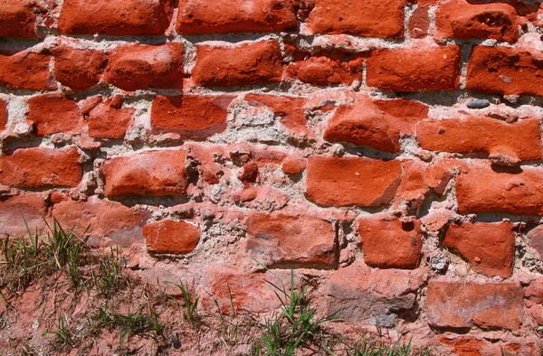 Antiguo muro de ladrillo que data de siglos atrás — Foto de Stock