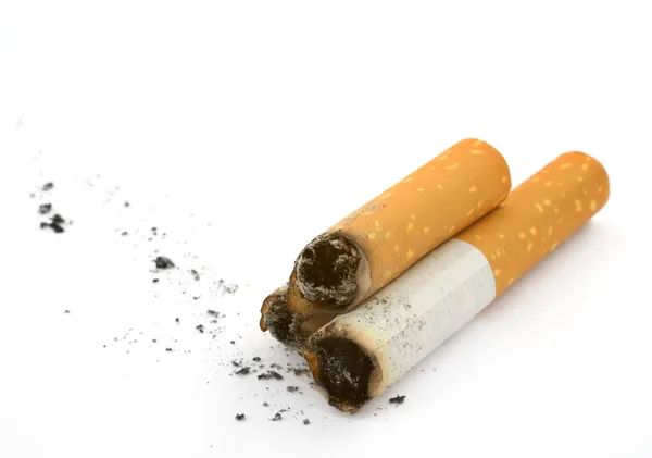 Три окурка сигарет — стоковое фото