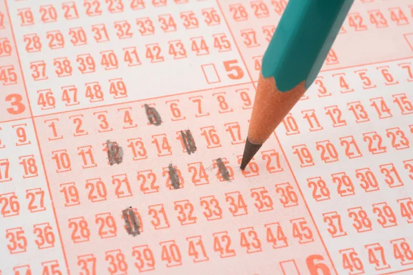 Lottery ticket and pencil — Stock Photo, Image