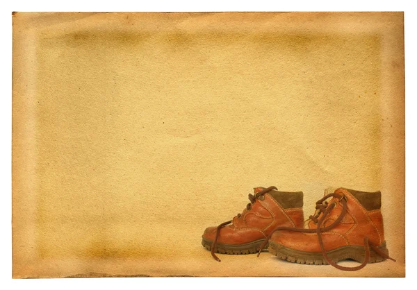 Støvler på retrobakgrunn – stockfoto