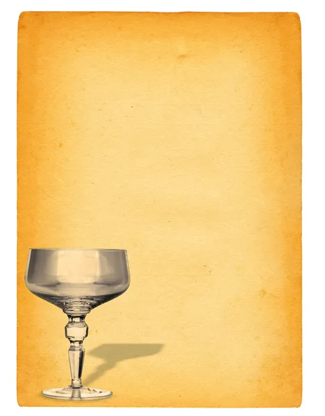 Bicchiere di champagne contro carta — Foto Stock