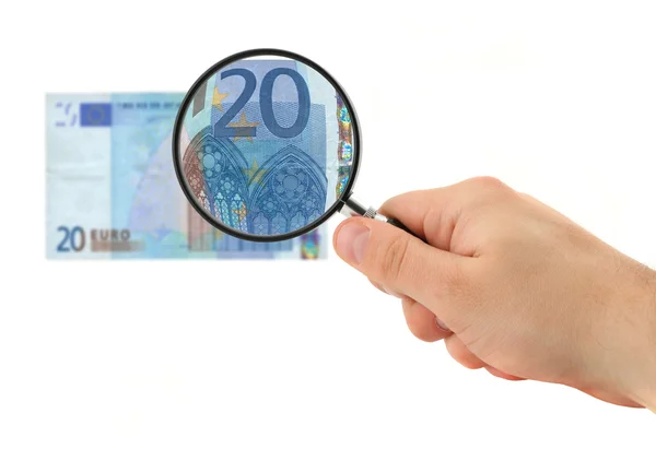Hand magnifying 20 Euro note — Stock Photo, Image