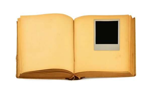오래 된 책 안쪽의 빈 사진 프레임을 — 스톡 사진
