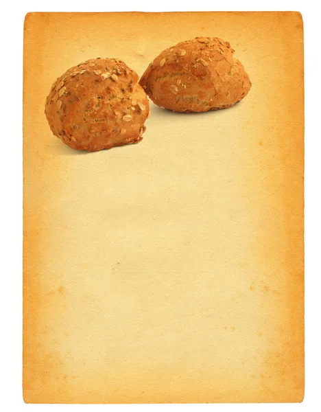 Old paper with wholewheat roll motif — Stock Photo, Image