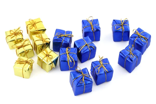 Golden and blue gifts isolated on white — Stock Photo, Image