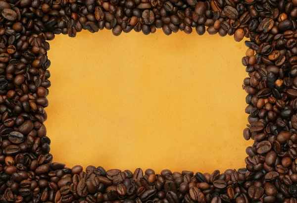 Marco de café sobre papel amarillento —  Fotos de Stock