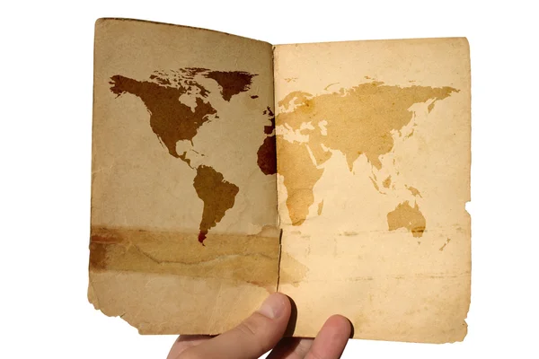 Mão segurando mapa mundo envelhecido — Fotografia de Stock