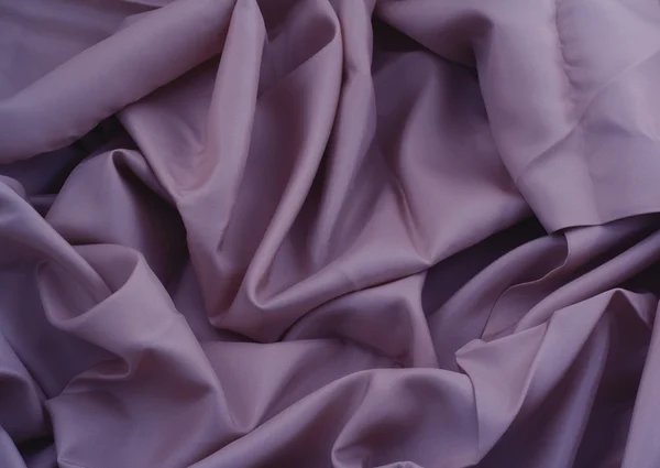 褶皱紫色缎的特写 — 图库照片