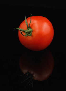 Tomato on black clipart