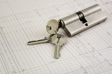 Door lock with keys on a building plans clipart
