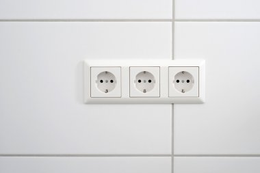Three white sockets clipart
