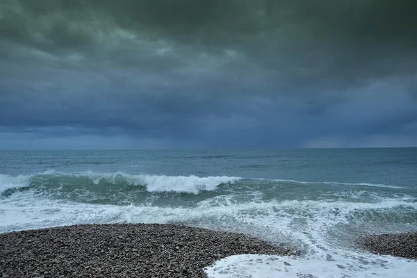 stock image Dark clouds on the coast