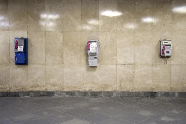 stock image Wall with three telephones