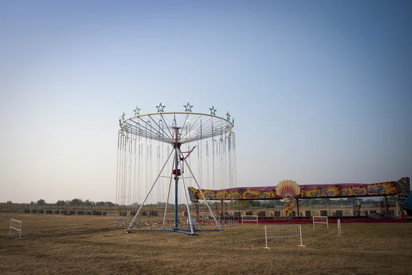 stock image Merry-go-round on a field