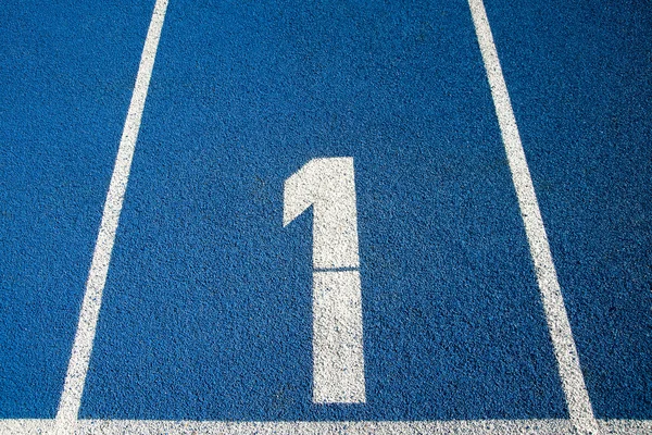 Number 1 on a running track — Stock Photo, Image