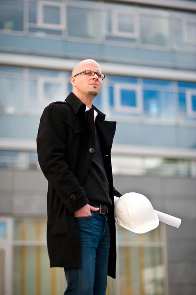 stock image Architect with helmet and plan