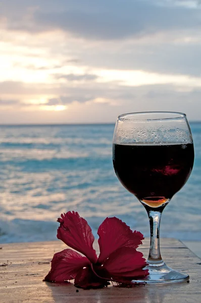 Glass of wine on the beach — Stock Photo, Image