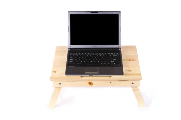 Laptop och tabell — Stockfoto