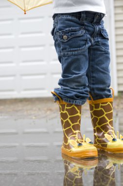 Girl in Cute Galoshes from Waste Down clipart