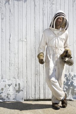 Beekeeper with Crossed Legs clipart