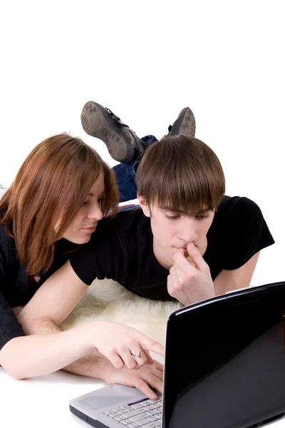 stock image Romantic couple working on laptop