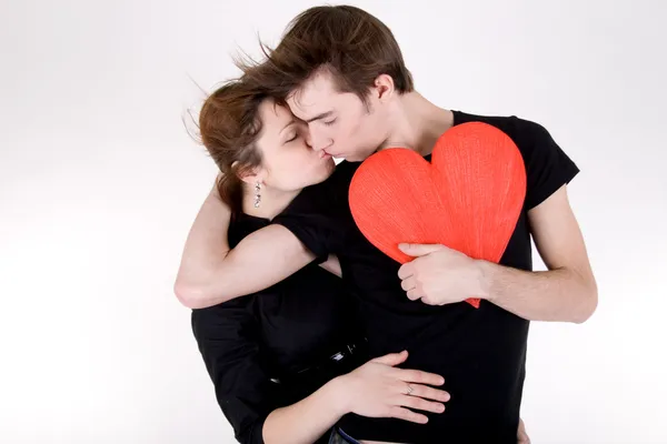 Romantic couple with red heart — Stock Photo, Image
