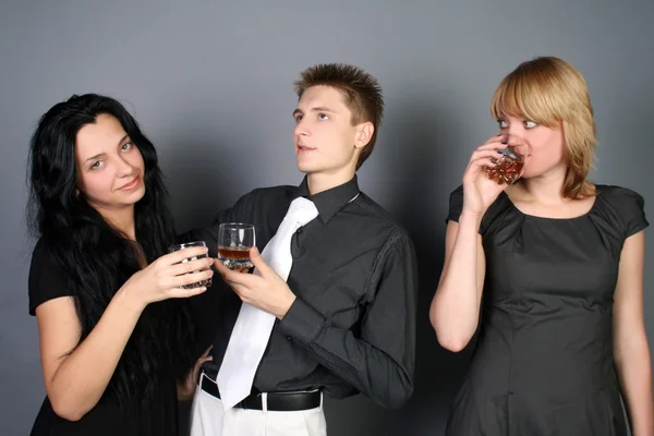 Three friends drinking whiskey — Stock Photo, Image