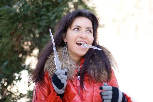 Funny girl with an icicle — Stock Photo, Image