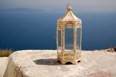 Vintage candle-holder in Santorini clipart