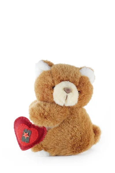 Плюшевий ведмідь і червоне серце Ліцензійні Стокові Зображення