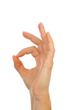 Woman's hand making OK sign clipart