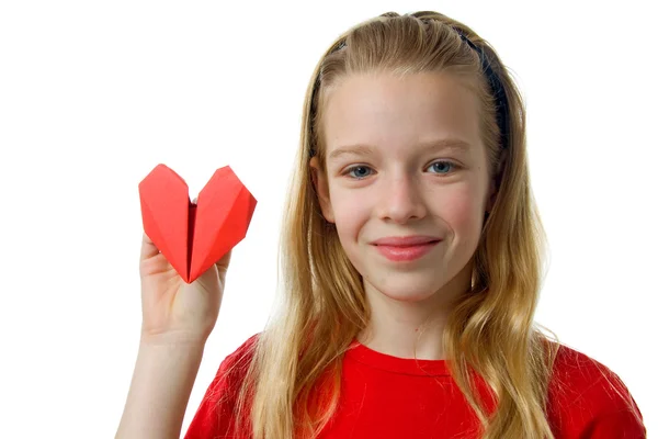 Young blonde girl with red heart — Stock Photo, Image