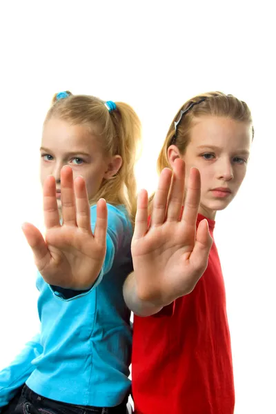 Dwie dziewczyny co znak stop — Zdjęcie stockowe