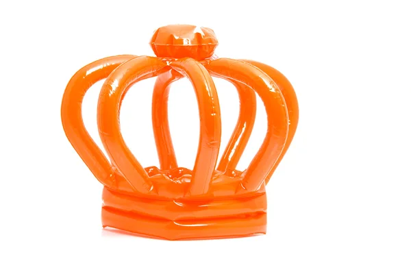 オレンジ色の王冠を吹き飛ばさ — ストック写真