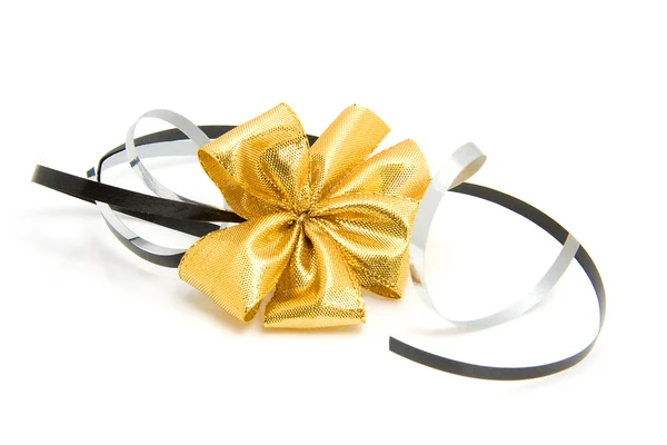 Golden bow with streamers — Stock Photo, Image