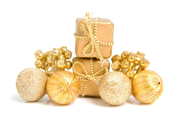 Golden presents and decoration — Stock Photo, Image