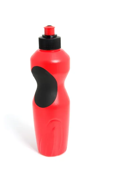 Frasco de bebida de plástico vermelho — Fotografia de Stock