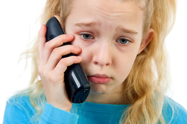 Chica triste en el teléfono — Foto de Stock