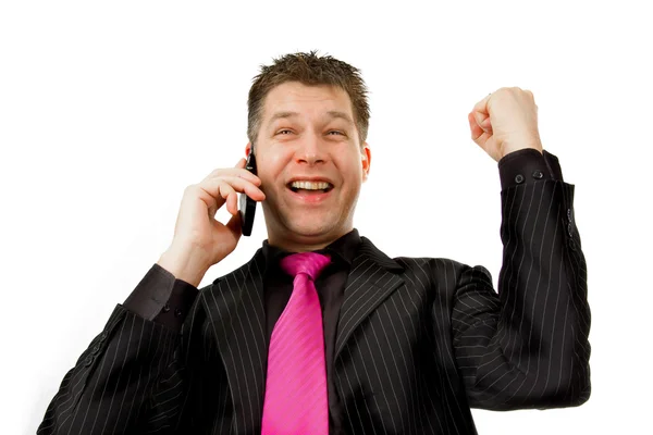 Счастливый бизнесмен по телефону — стоковое фото