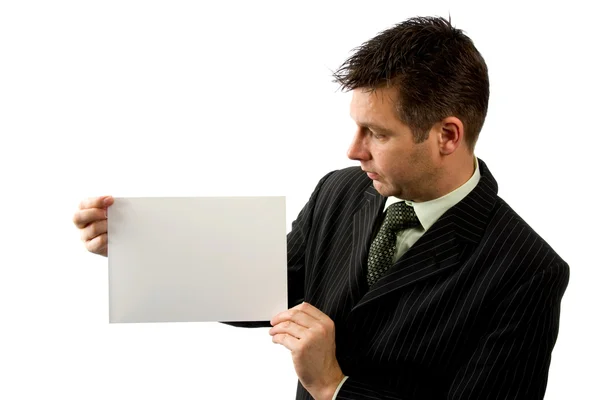 Businessman is holding empty board — Stock Photo, Image