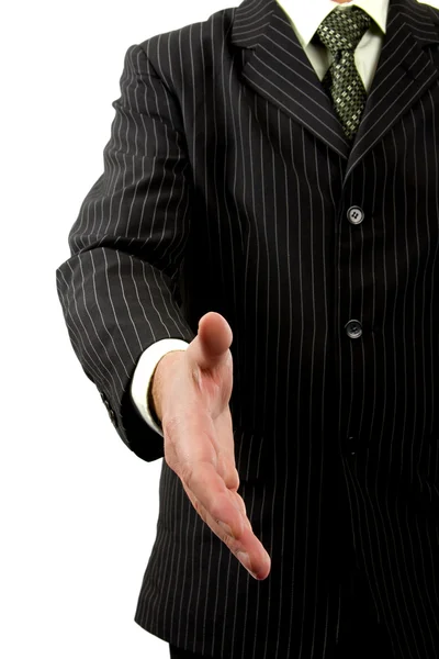 Businessman shakes hand — Stock Photo, Image