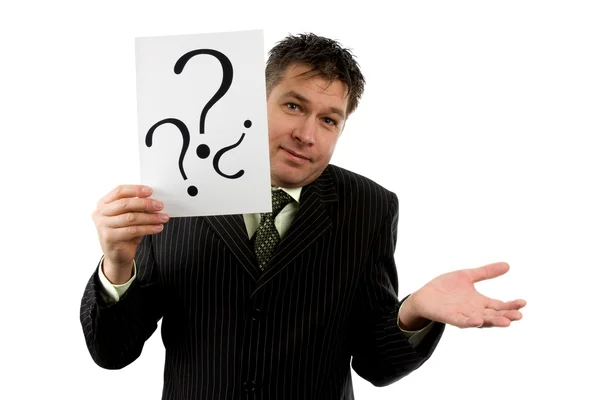 Businessman is holding question marks — Stock Photo, Image