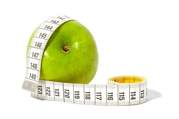 Pomme verte avec ruban à mesurer — Photo