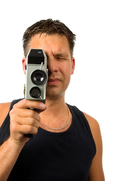Man met oude ouderwetse filmcamera — Stockfoto