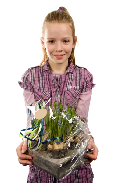 Young blonde girl with flowers — Stock Photo, Image